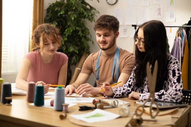 Команда студии за столом